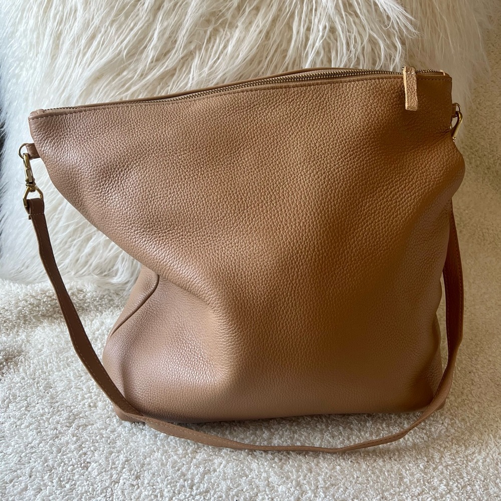 Tan hobo bag by Primecut. Barely used and in excellent condition!